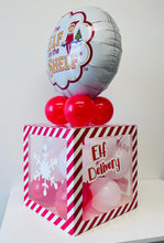 Load image into Gallery viewer, Decorative box with balloons featuring &#39;Elf on the Shelf&#39; theme on a white surface.
